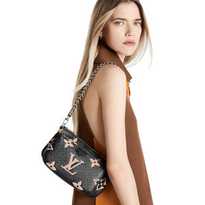 Louis Vuitton Multi Pochette Accessoires in Bicolor Monogram Empreinte Black/Beige